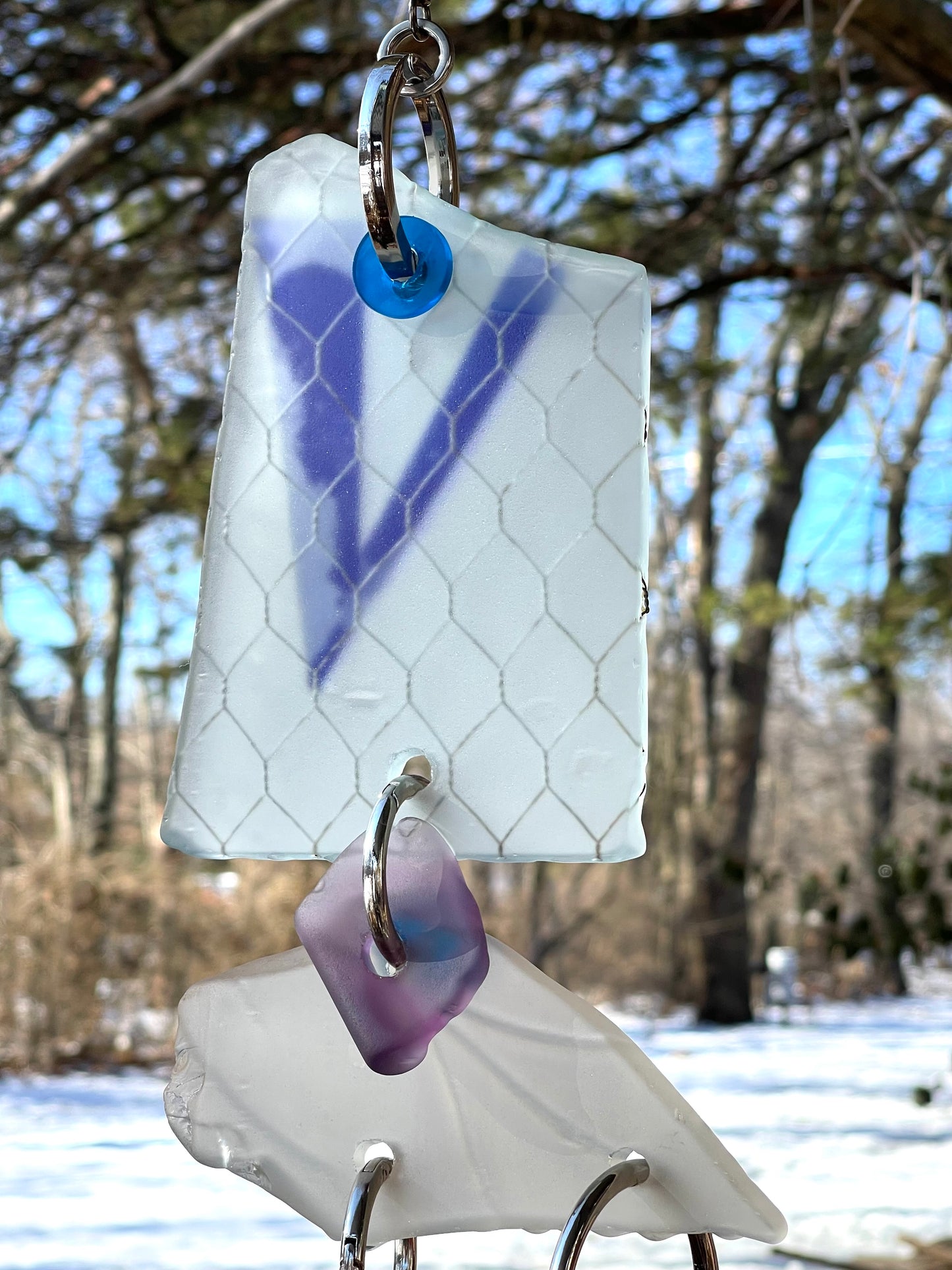 Chunky repurposed glass sun chain with a sweet bruise that glows warmly in sunlight