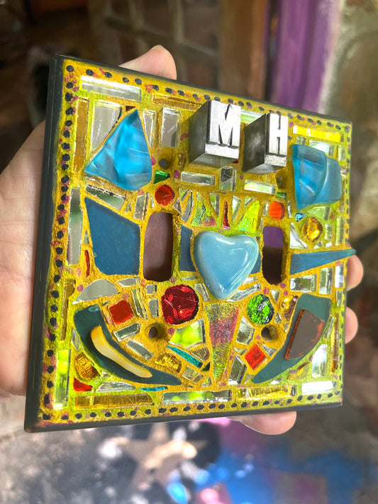 Fancy My Heart double toggle mosaic light switch cover. Old newspaper type MH for My Heart sentiment. Heart is Talavera ceramic. Wall art.